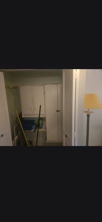 hall closet (across from half bath)