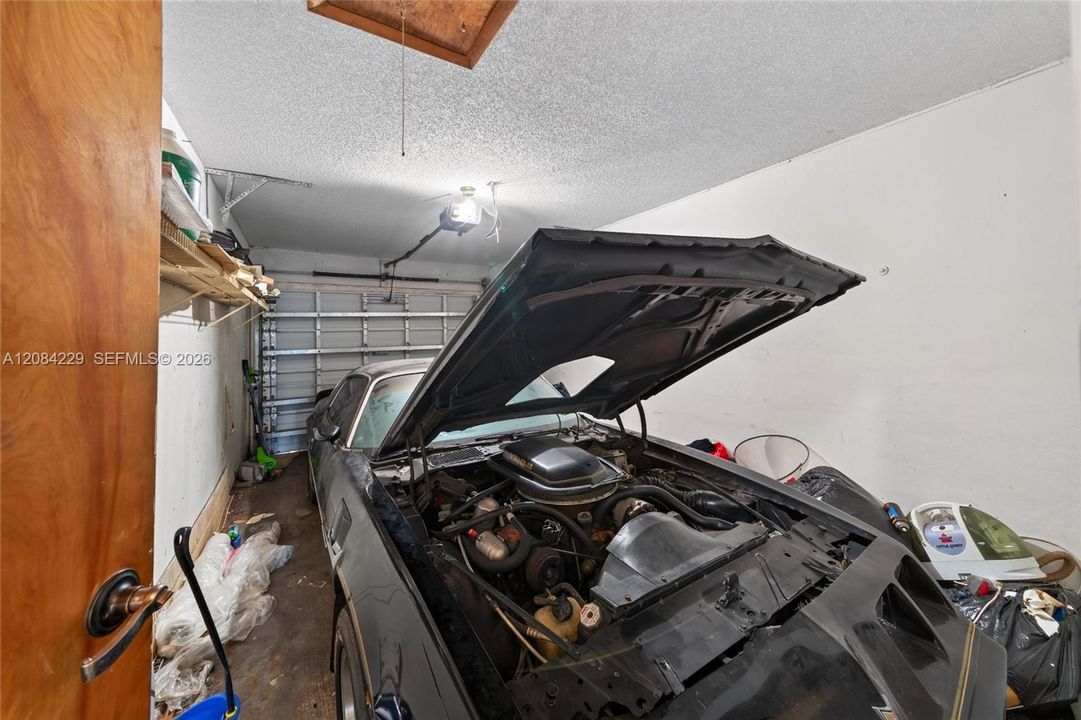 1 car garage, not converted! Crawl & storage space in the attic.