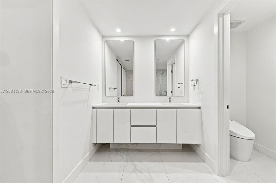 Dual sink vanity with generous storage.