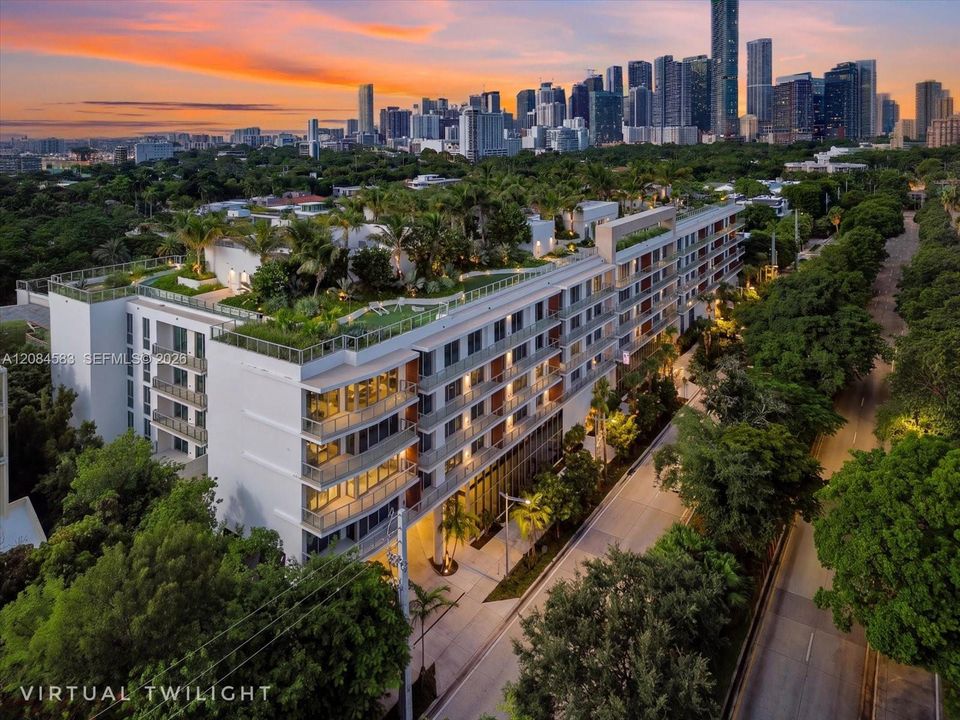 Aerial view of 2200 Brickell with the Miami skyline beyond - virtual twilight