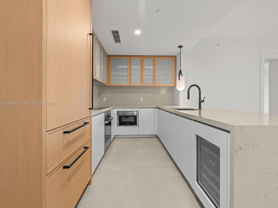Kitchen island with  built in wine cooler