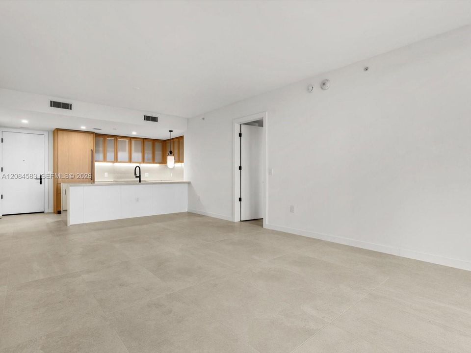 Spacious living and dining area with abundant natural light