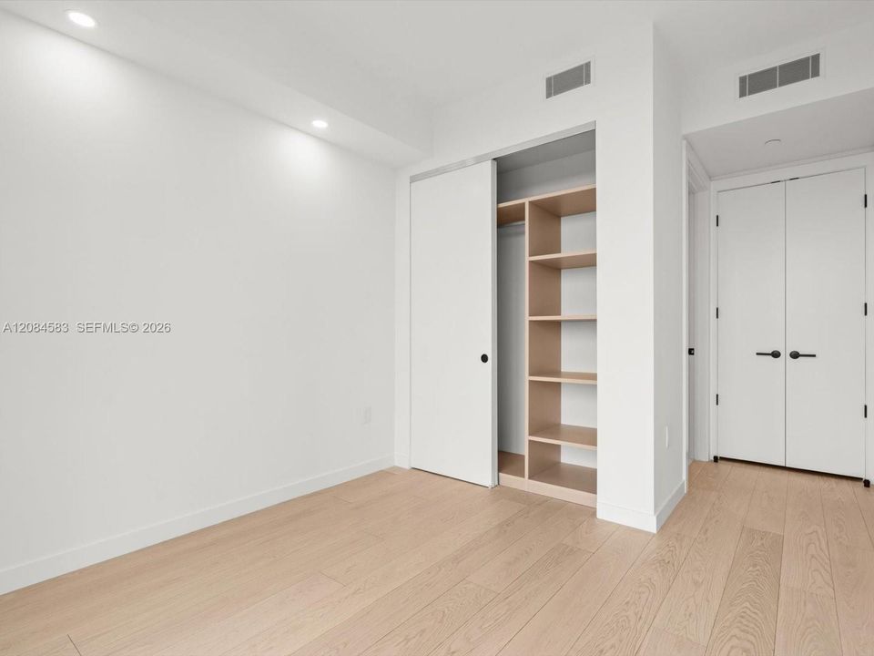 Third bedroom with built-out closet