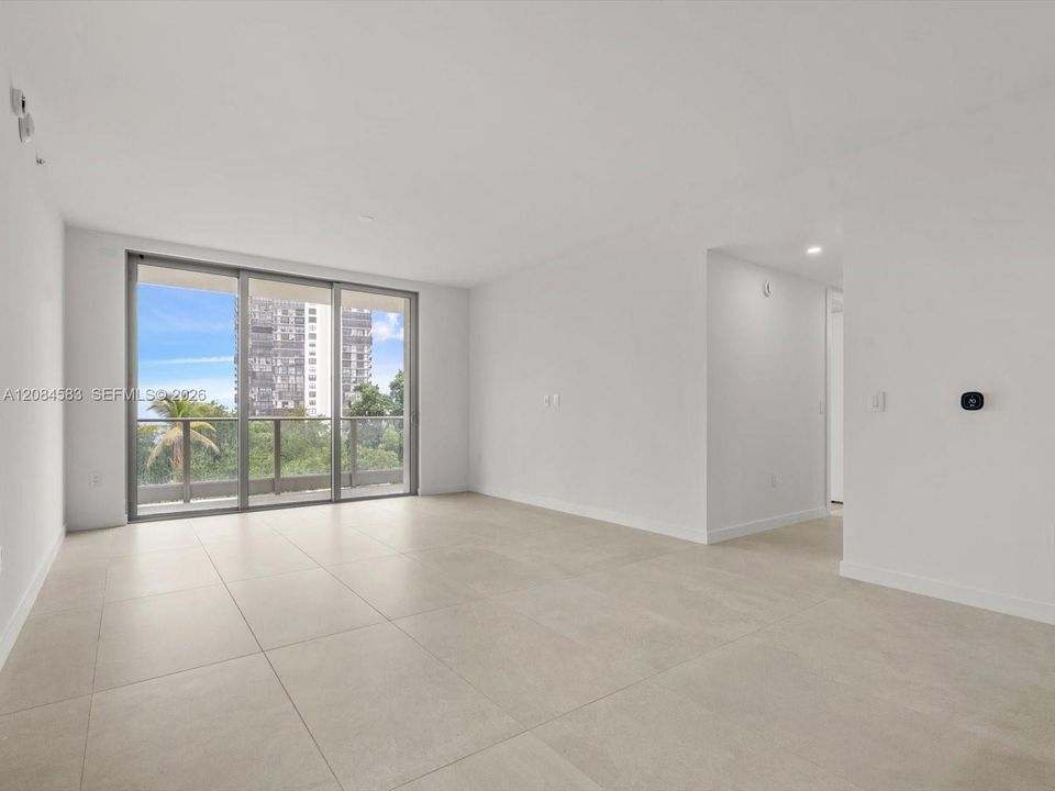 Open living area with direct access to private balcony