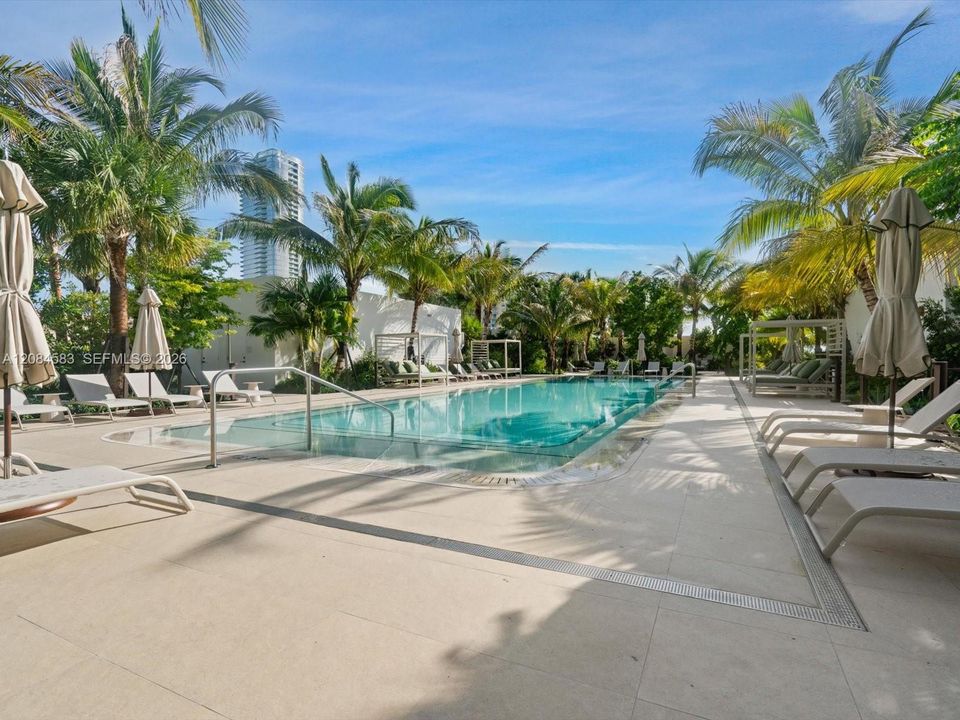One-acre rooftop amenity deck with resort-style pool