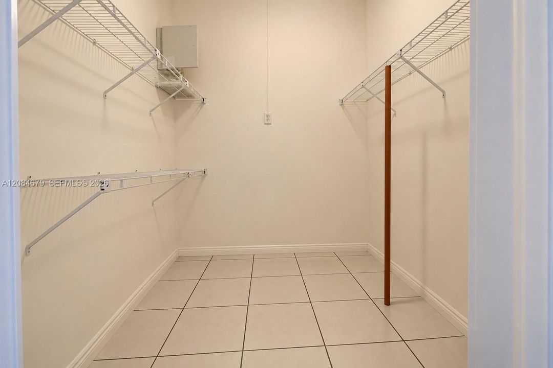 Primary Bedroom Walk in closet