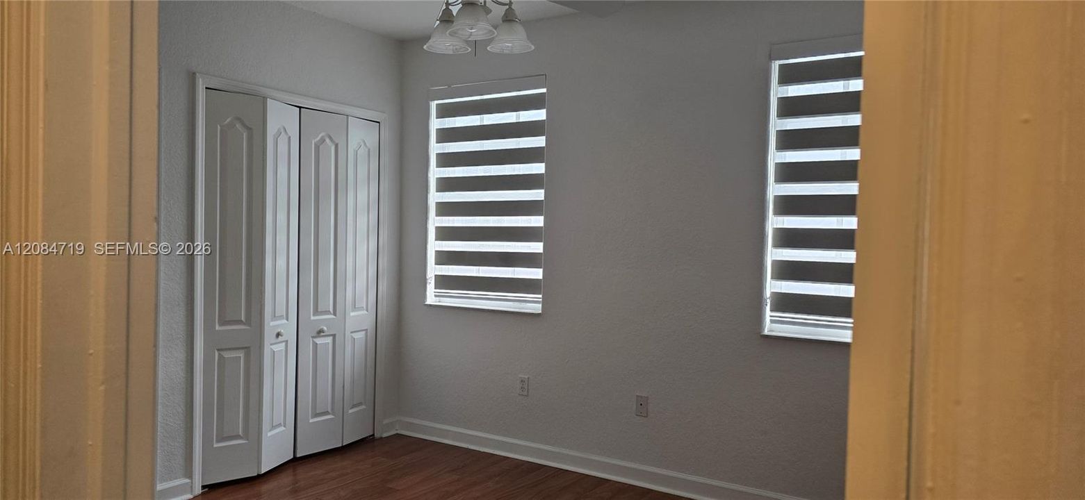 The bedroom features a closet and access to a shared Jack and Jill' bathroom.