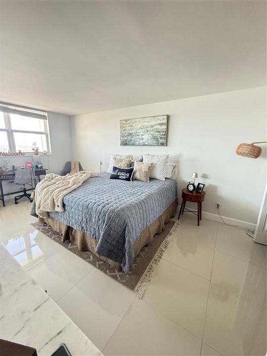 Main bedroom with lots of light and oversized.