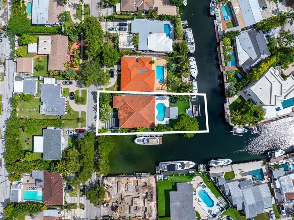 272 feet of double waterfront on a 12,300 SF corner lot