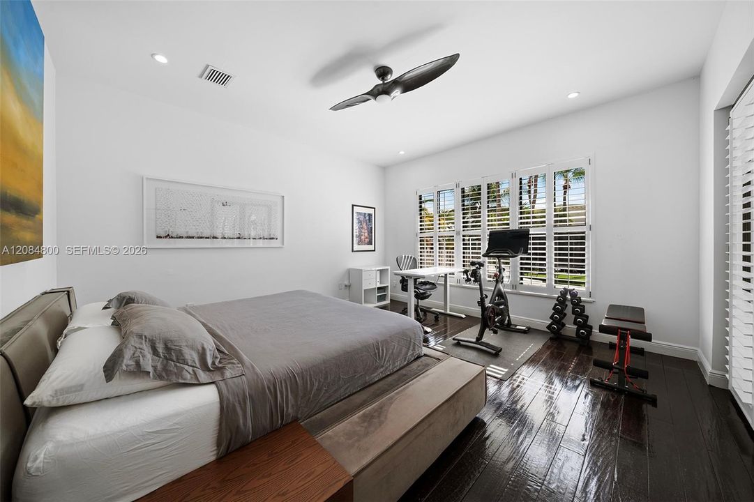 The primary suite overlooks the garden