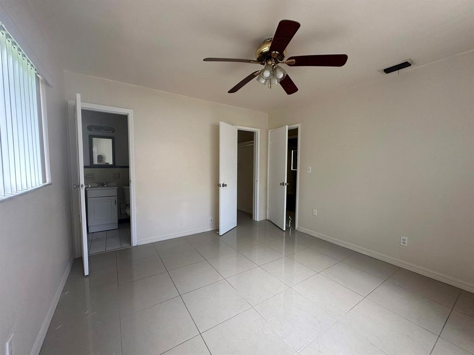 Primary bedroom with bathroom