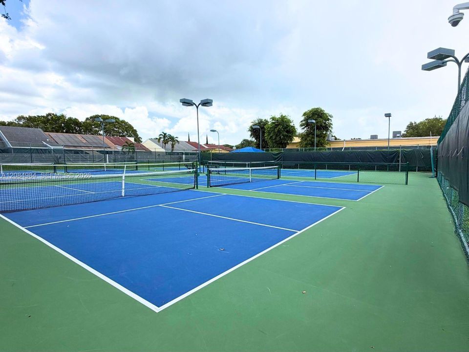 Well-maintained community tennis courts available for residents.