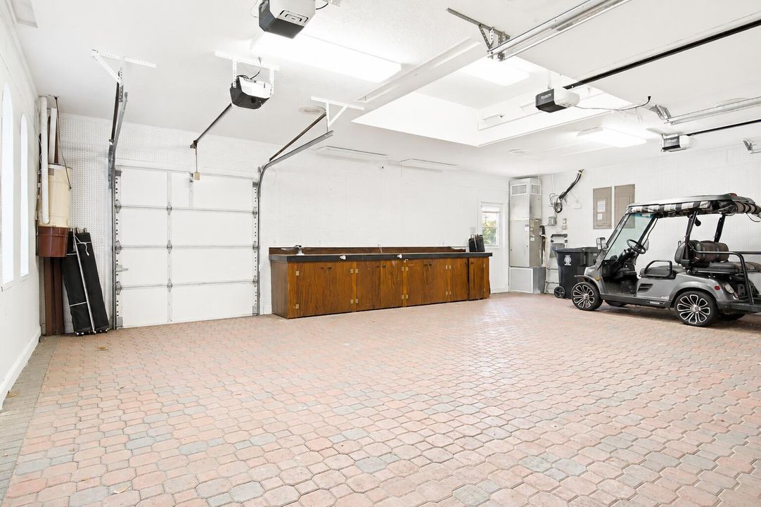 garage with golf cart garage door
