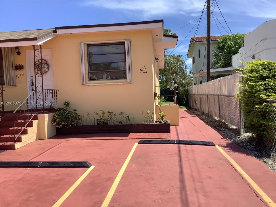 Entrance is on the side of 1919 , walk towards the rear of the property, walk up to second floor of 1921 . Parking is included **FPL , water and WiFi included **