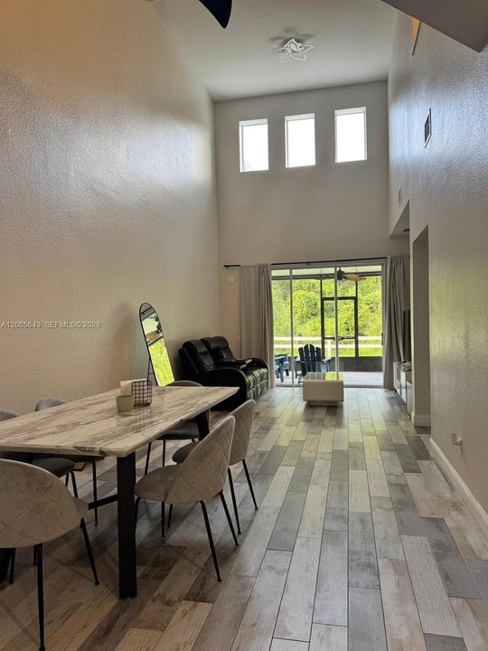 Dining Area + Living Room Shown