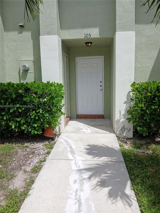 Covered entrance while you unlock the door if raining is nice