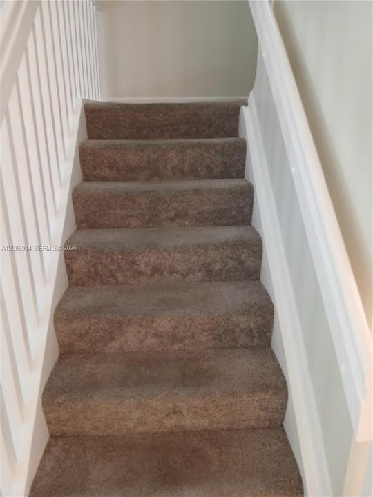 Stairs with a landing before proceeding up the second set of steps