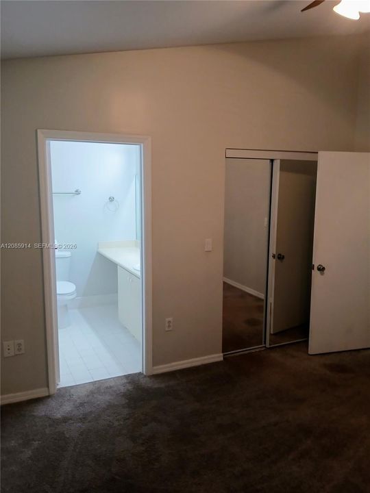 Vaulted ceilings and door to master bath