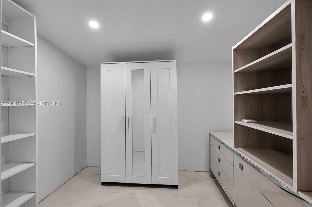 Generous primary walk-in closet