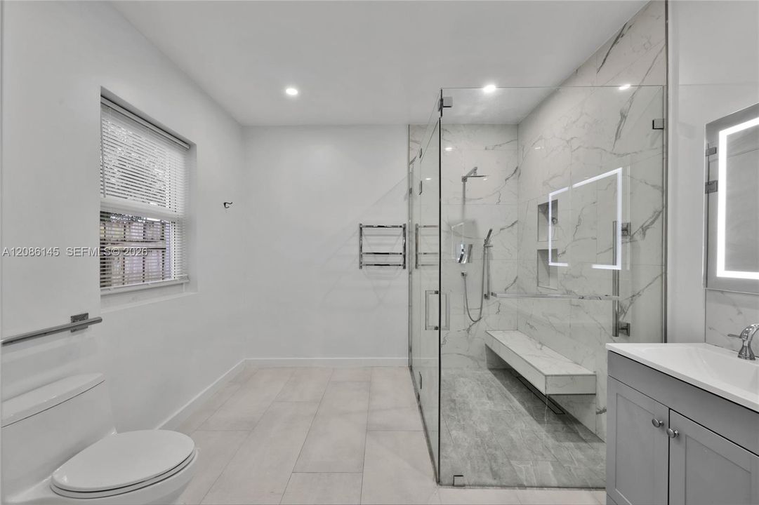 Walk-in shower with built-in seat