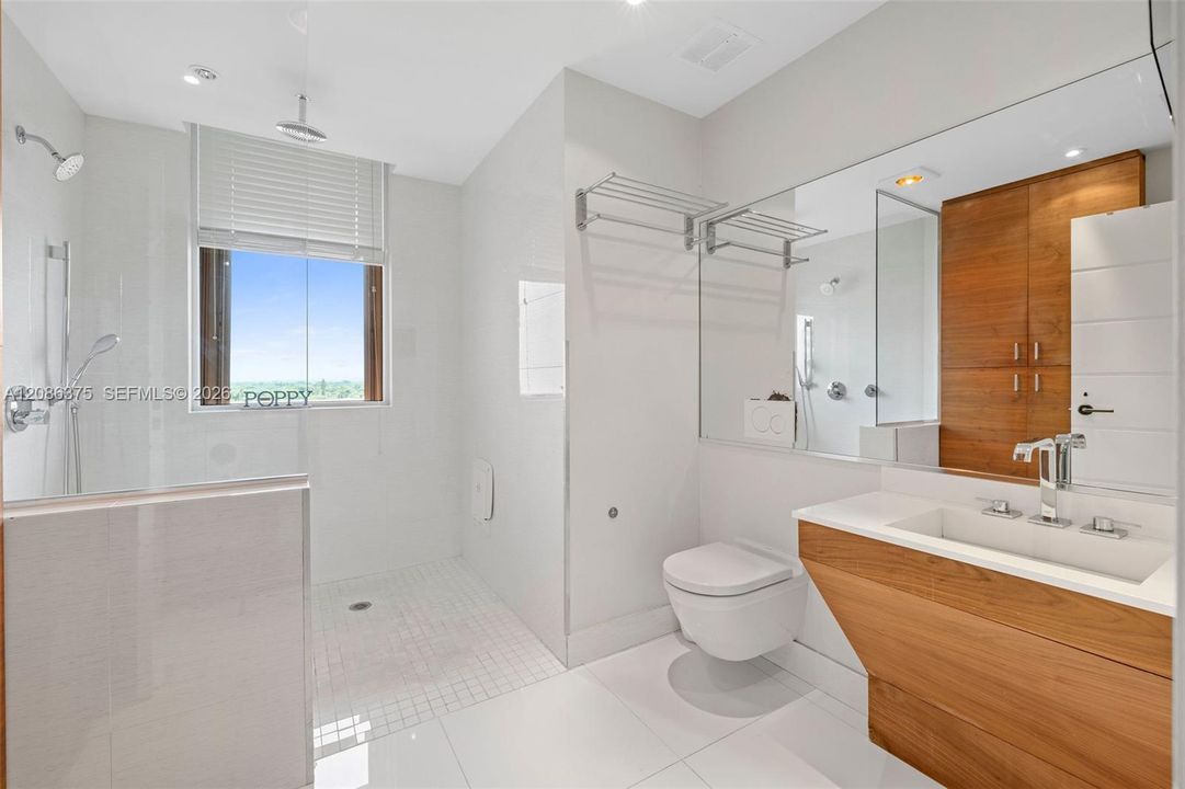 Primary Bathroom #2 with large walk-in shower.