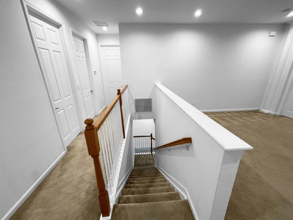 Staircase going dow from loft