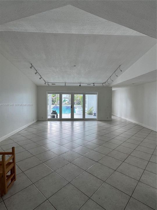 Living room overlooking pool