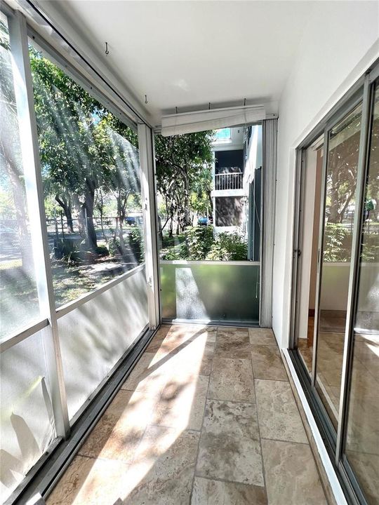 SCREENED PORCH - ACCORDION SHUTTERS