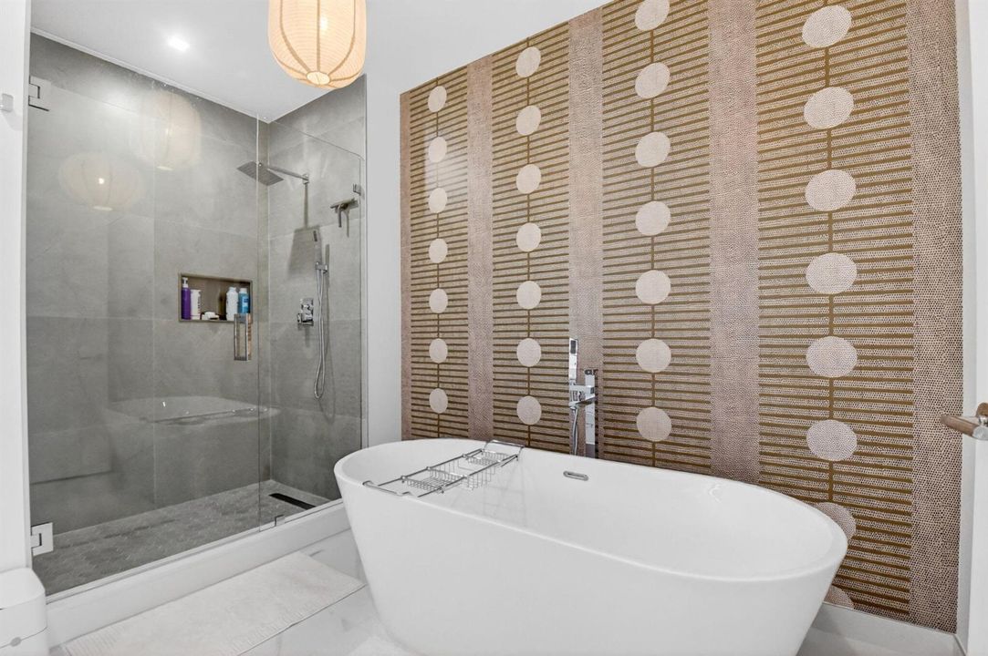 Master bathroom with shower and tub