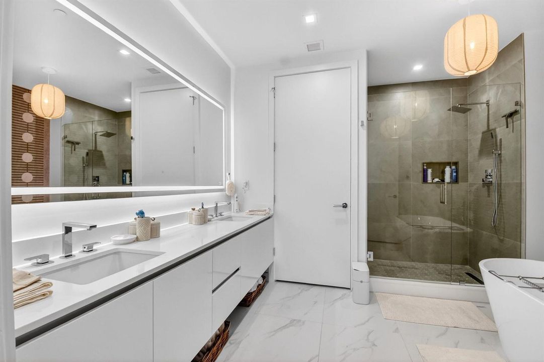 Master bathroom with shower and tub
