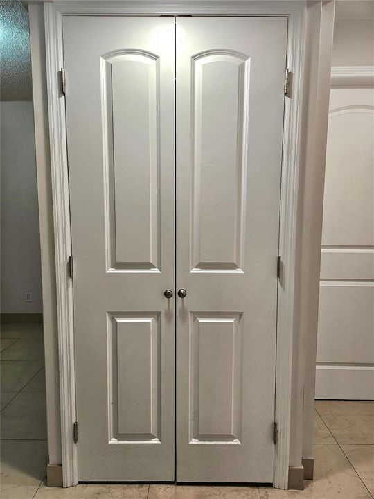 FRENCH DOORS HOUSING YOUR WASHER & DRYER