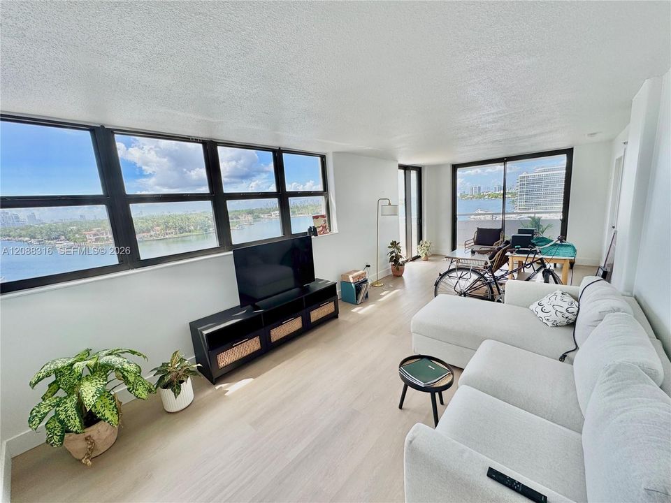 Living room with wraparound water views