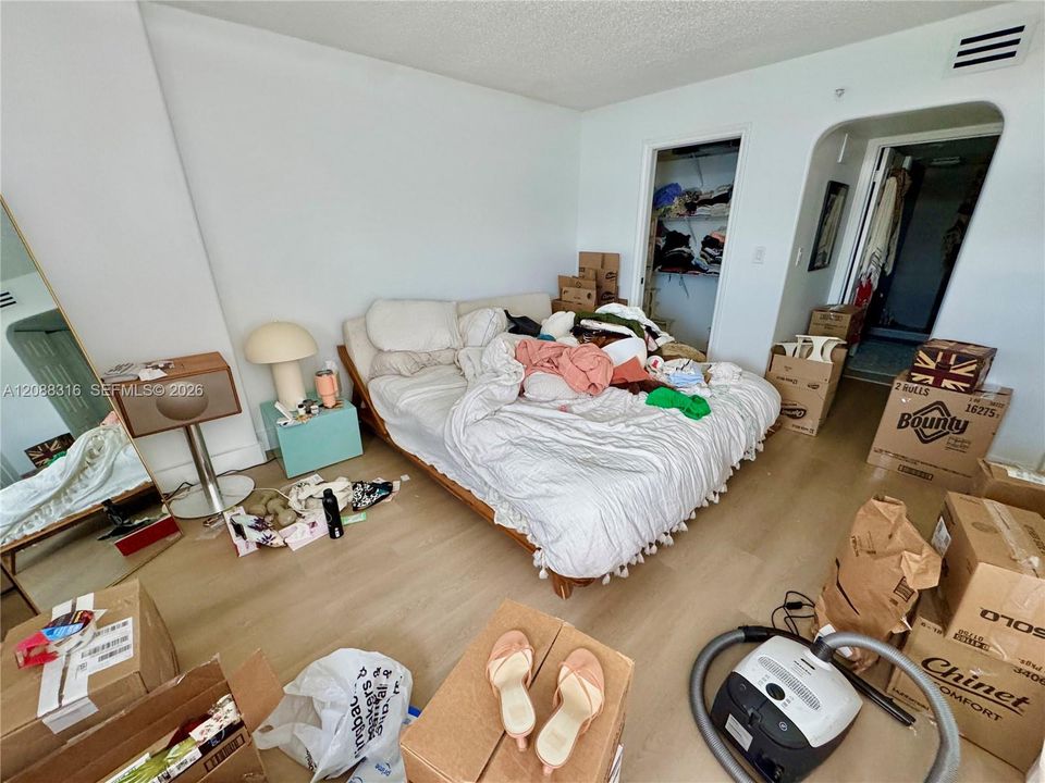Spacious primary bedroom with ensuite bathroom and lots of walk-in closet space.