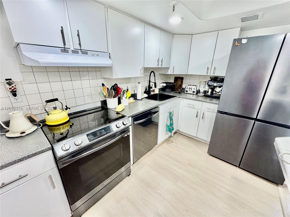 Kitchen with stainless steel appliances