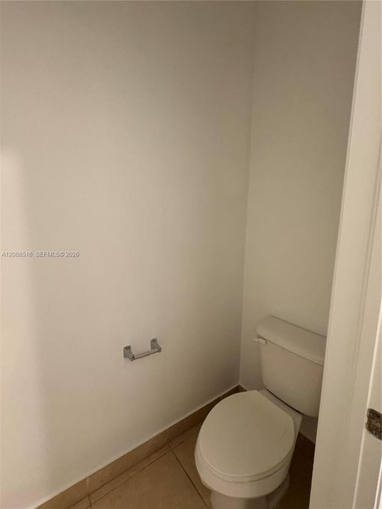 Toilet room within Primary bathroom