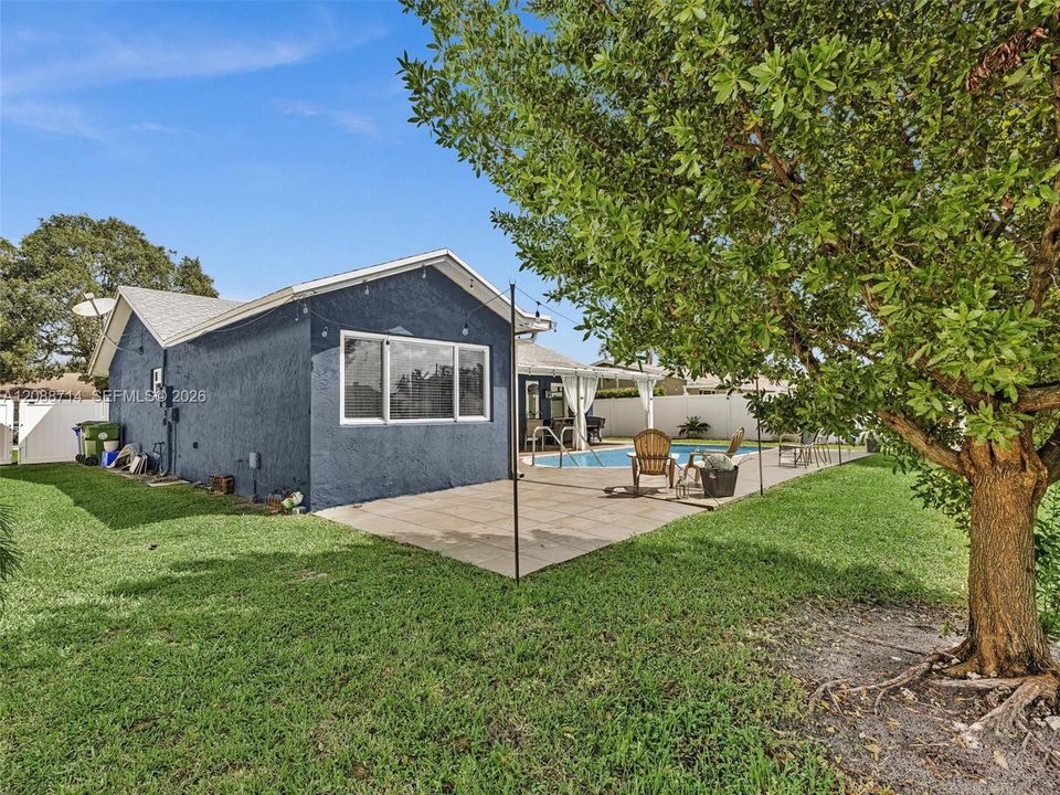 Double gate on side of home to accommodate an RV or boat.