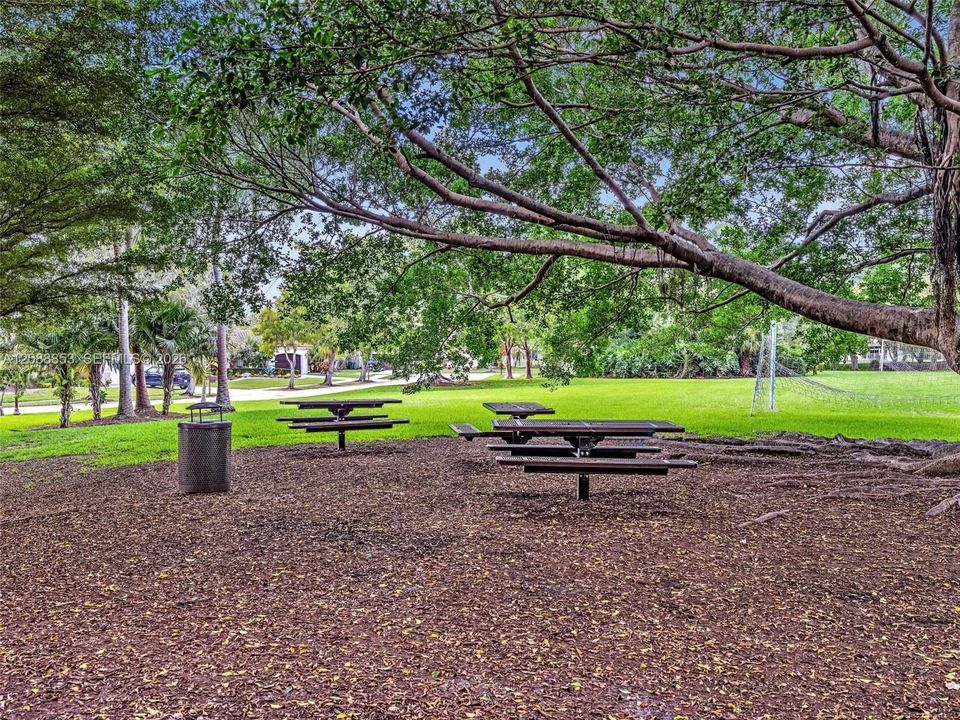 Expansive green space with soccer field, ideal for recreation and events