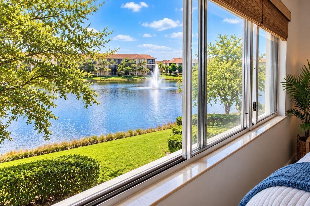 20-master_bedroom_window_staged_lake_vie