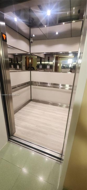 Modern fast elevators with 3 on each floor