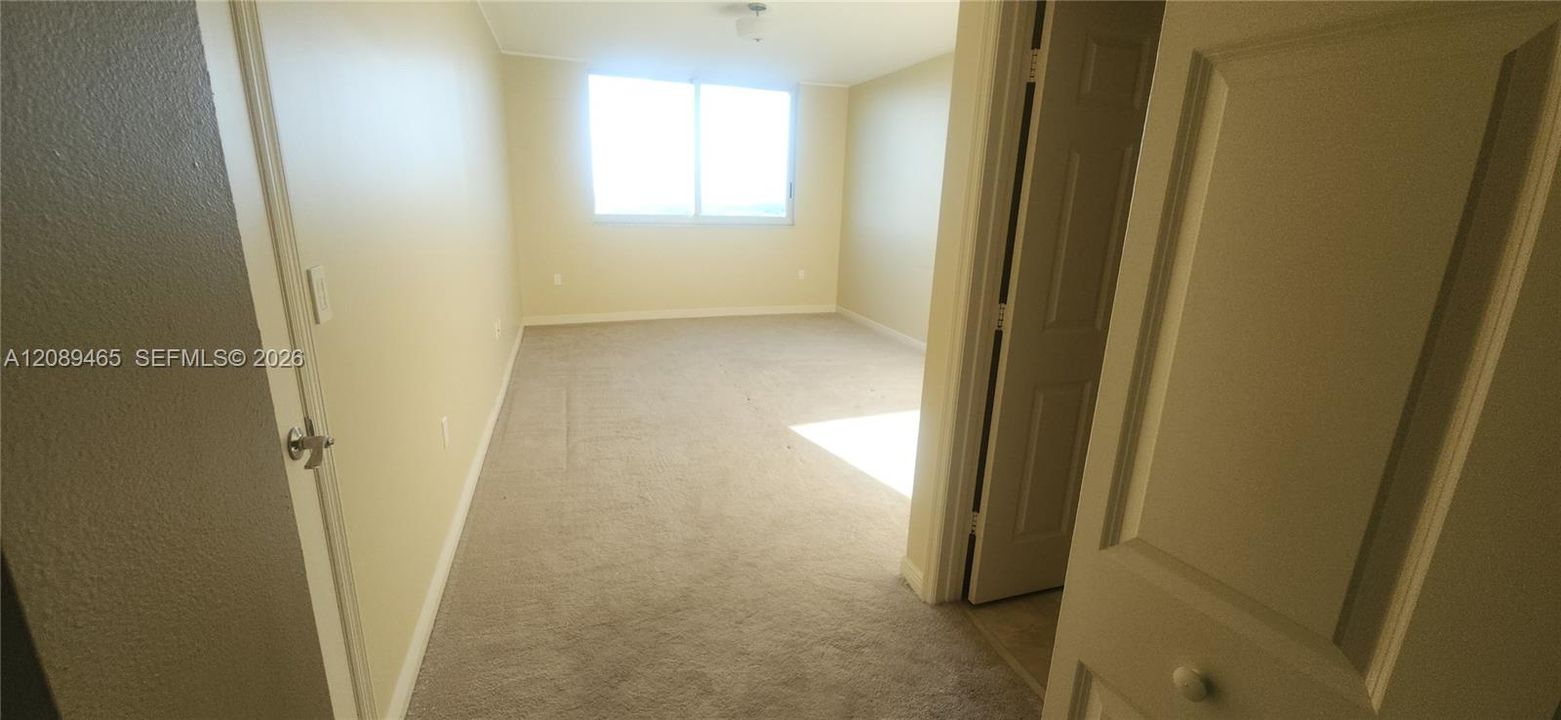 spacious master bedroom with private bathroom show