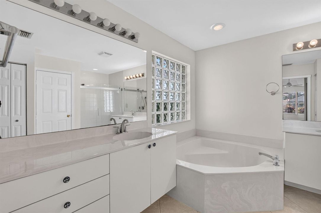 Dual vanity Roman tub & separate shower