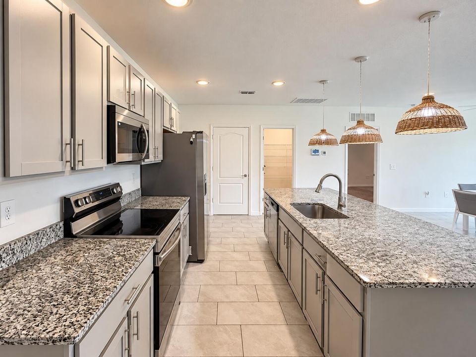 Bright Modern Kitchen with Wicker Pendan