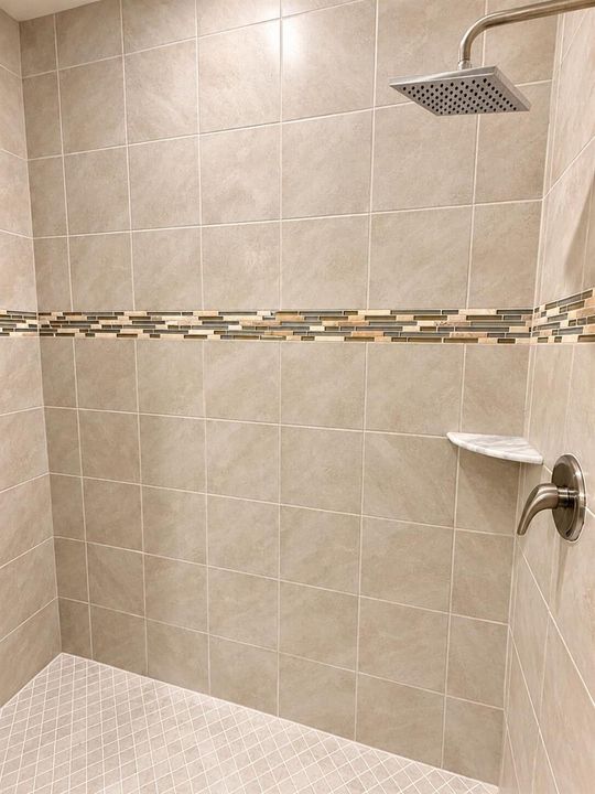 Modern Beige Tile Shower with Mosaic Acc