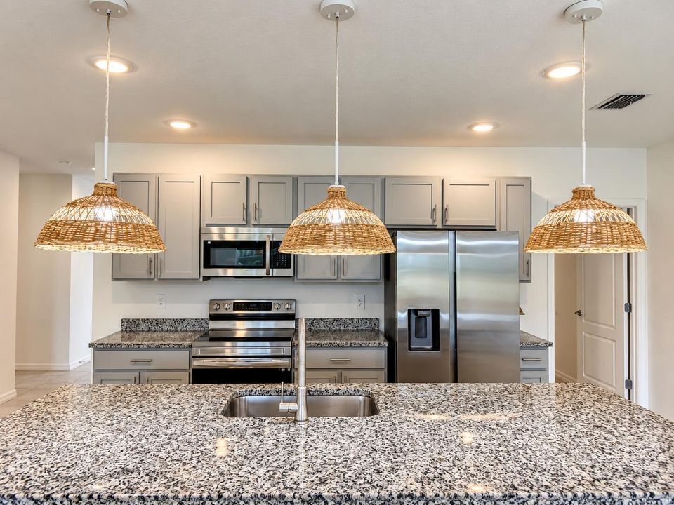 Warm Modern Wicker-Lit Kitchen