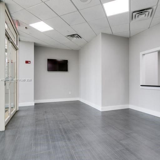 Other angle of waiting area. Entrance from Museum Plaza to the left, reception window to the right