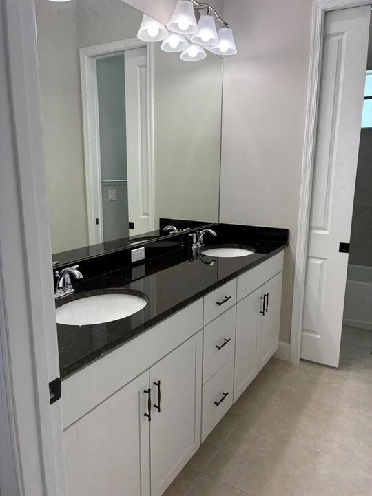 Upstairs bathroom double vanity and larg