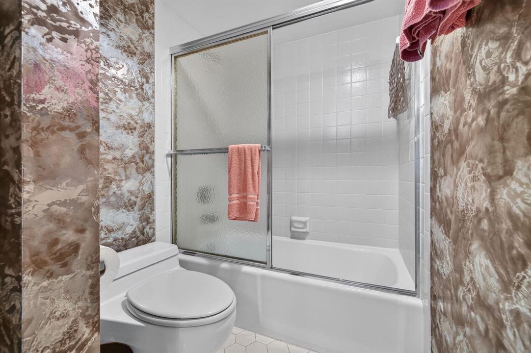 GUEST BATH WITH TUB SHOWER COMBO