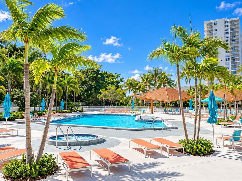 Heated resort-style pool with lounging deck.