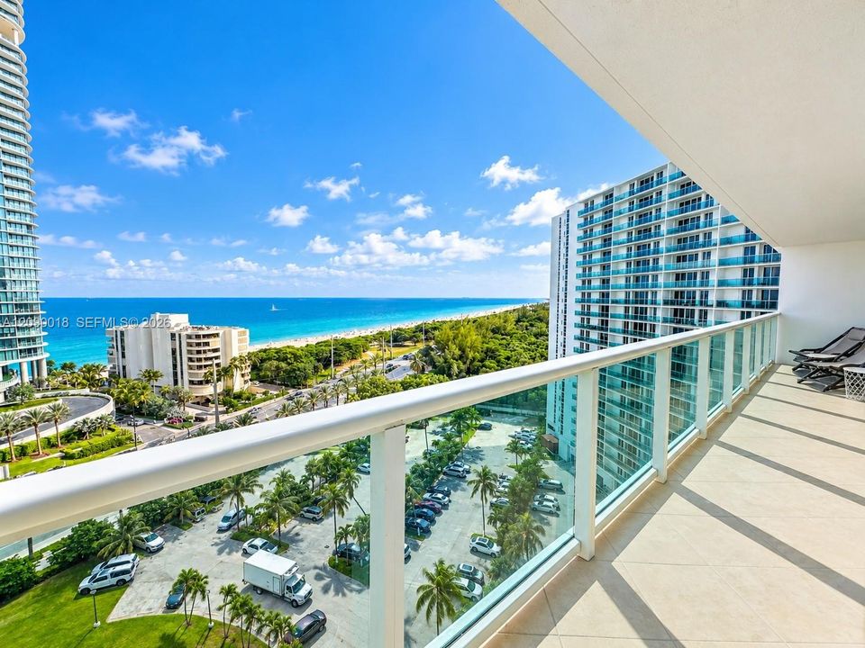 Expansive private balcony with stunning ocean and water views.