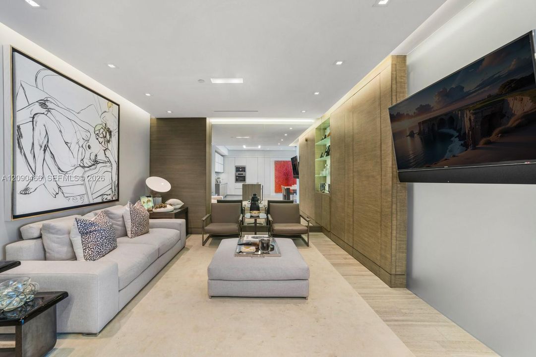 This room can be a third bedroom, there is a full bathroom and a closet.